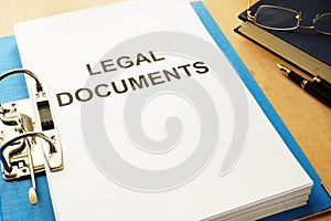 Folder with title Legal Documents in an office. photo