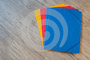 Folders in different colors.Office background