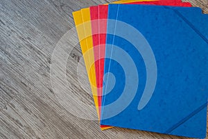 Folders in different colors.Office background