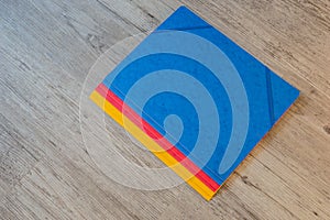 Folders in different colors. Office background