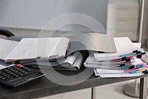 Folders with documents and calculator