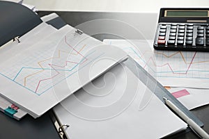 Folders with documents and calculator