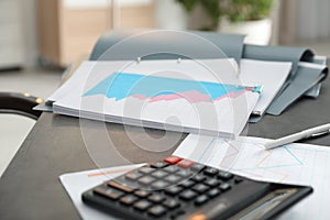 Folders with documents and calculator