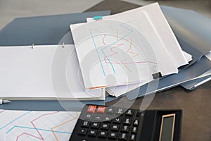 Folders with documents and calculator