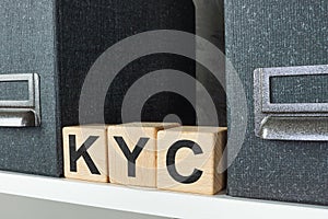 Folders with documents and letters KYC know your customer.