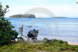 Folding bicycle at Pacific sea coast