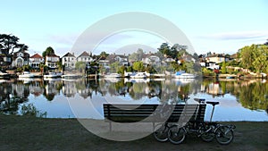 Folding bicycles near Thames River photo