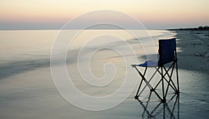 Folding chair on a seaside