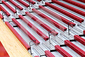 Folding gymnasium bleachers in a high school.