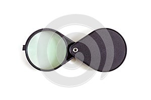 Folding magnifier with plastic case on white