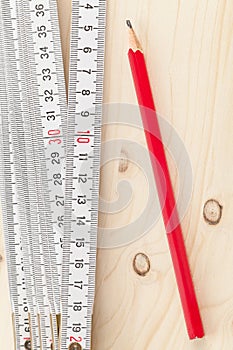 Folding rule with pencil