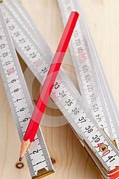 Folding rule with pencil