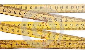 Folding ruler on white background