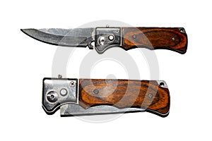 Folding switchblade knife with a button.Switchblade knife on a white background.Folding knife with wooden handle.