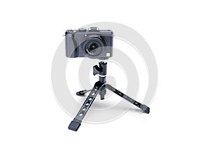 Folding tripod with compact camera