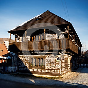 Folk art in Cicmany. Folk painted house