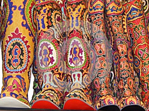 Folk crafts. High boots with oriental embroidery.