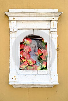 Folk votive shrine with the sacred image of the blessed virgin