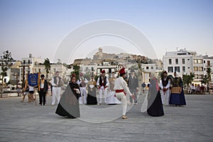 Folklore group performs traditional dance in traditional costume