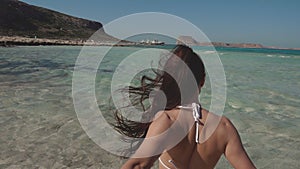 Follow me, sporty women creating content on travel holiday in luxury greece vacation. Pretty booty in bikini. Filmed on