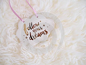 Follow your Dream sign Cloud on White furry Fantasy background