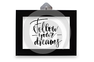 Follow your dreams. Handwritten text. Modern calligraphy. Black