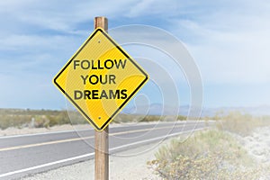 Follow your dreams road sign