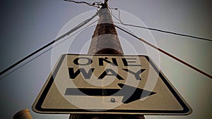 Following the Arrow of Singular Direction of a One Way Sign