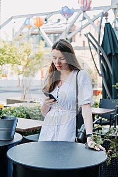 FOMO, Fear of missing out, social anxiety, stay continually connected, fear of regret, Social networking. Woman Checking