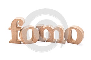 FOMO wood word