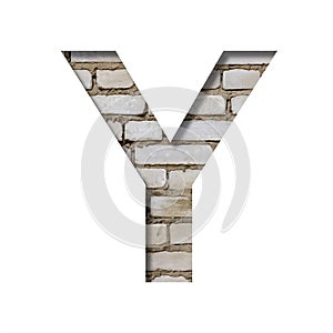 Font on white brick. The letter Y is cut from white paper the background of a sloppy white brick wall. Popular decorative fonts