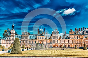 FONTAINEBLEAU, FRANCE - JULY 09, 2016 : Suburban Residence of the France Kings - facade  beautiful Chateau Fontainebleau and