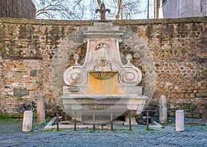Fontana del Mascherone along Via Giulia, in Rome, Italy.