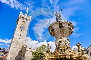 Fontana del Nettuno Neptune fountain in Trento and the Torre C