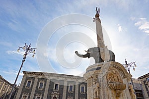 Fontana dell Elefante obelisk in the center of Piazza del Duomo in Catania, Sicily in strong backlight photo