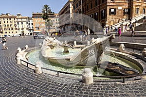 Fontana della Barcaccia in Piazza Spagna. This fountain is at the center of the square, represents a wrecked ship, made by Pietro