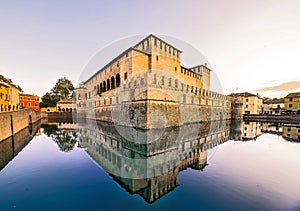 Fontanellato castle and moat with reflection at sunset, Parma, Italy