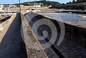 Salinas de Rio Maior, system of shallow water compartments for salt extraction, Fonte da Bica, near Rio Maior, Portugal photo