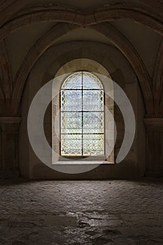 Fontenay Abbey in France. Image of a stained glass window.