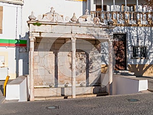 Fontinha, the 16th century renaissance fountain in Republica Square of Alter do Chao.