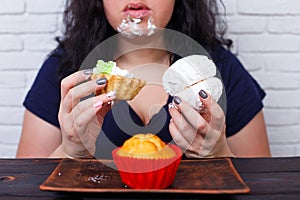 Food addiction, dieting concept. Young overweight woman fed up w