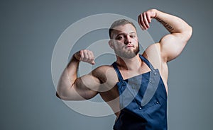 food additives for sportsman. daily calorie diet. sexy chef in apron. muscular man cooking. healthy food and dieting