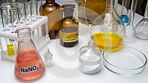 Food additives in test tubes and flasks on the laboratory table. food laboratory.