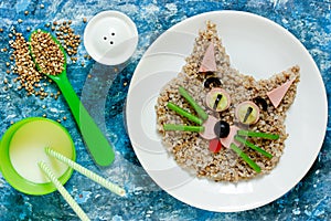 Food art idea for kids - buckwheat cat, animal face buckwheat porridge