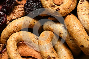 Food as a background - whole grain wheat bagels with dried fruits
