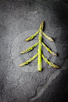 Food background. Christmas tree made from asparagus Healthy holiday concept