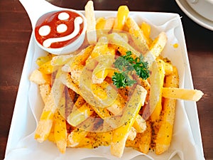 food background french fries snack food placed on dish with tomato sauce. image for fast food, reataurant, unhealthy concept