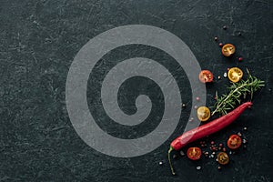 Food background with spices and tomato