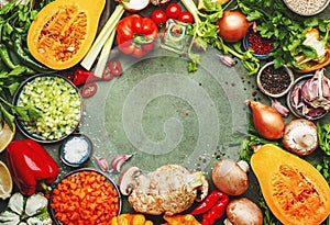 Food background. Vegetables, mushrooms, roots, spices - ingredients for vegan cooking. Healthy eating, diet, comfort slow food.