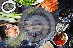 Food background, a wooden table, top, sushi, rolls, cucumbers, Chuka, shrimp, salmon,